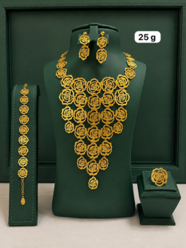 Elevated you with the timeless beauty of a collection of gold necklaces adorned with flowers.